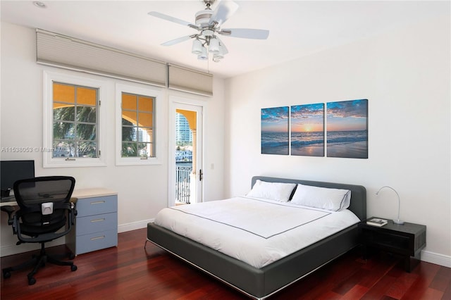 bedroom featuring ceiling fan, dark hardwood / wood-style flooring, and access to outside