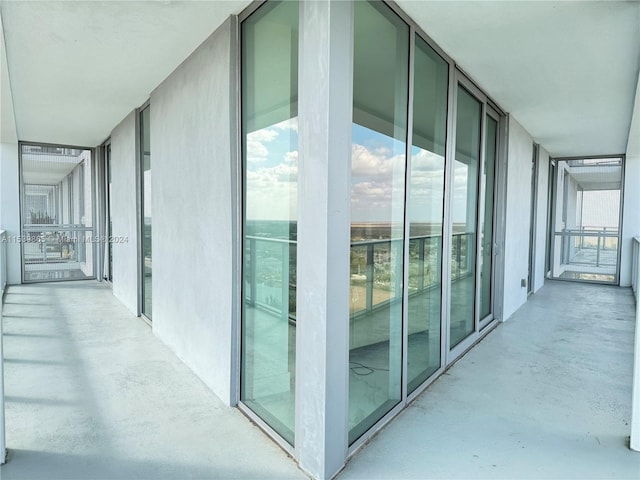 hallway with a wall of windows