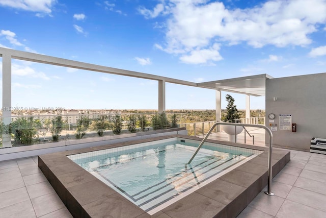 view of pool featuring a patio