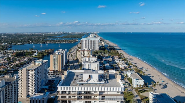 bird's eye view featuring a water view and a view of the beach