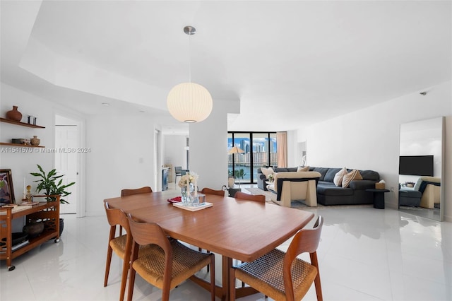 dining room featuring light tile flooring