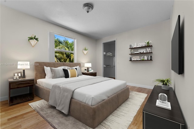 bedroom featuring light hardwood / wood-style flooring