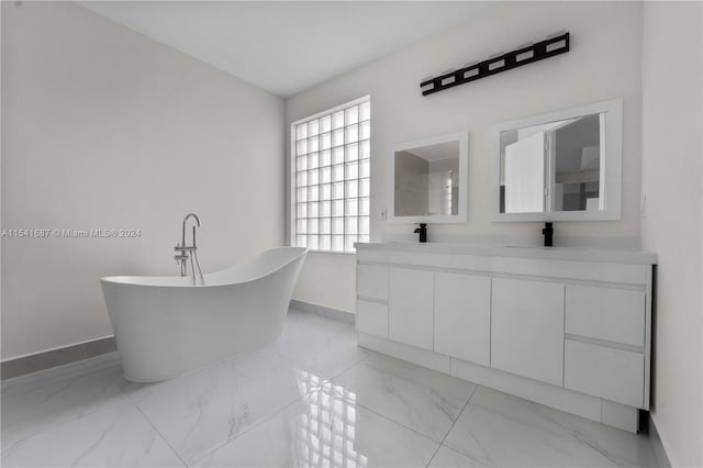 bathroom featuring vanity and tile flooring