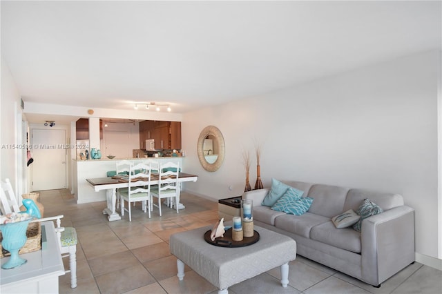 tiled living room with track lighting