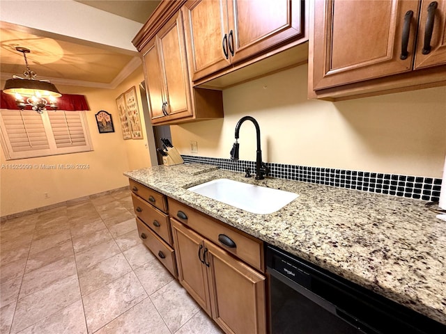 kitchen with dishwasher, light tile floors, hanging light fixtures, sink, and ornamental molding