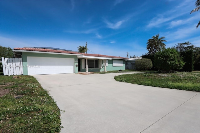 ranch-style home with a garage