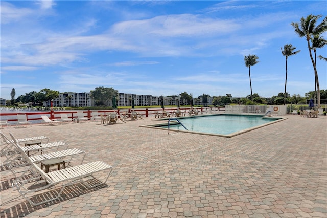 view of pool featuring a patio area