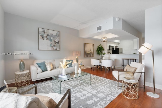 living room with hardwood / wood-style floors