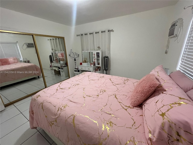 tiled bedroom featuring a closet