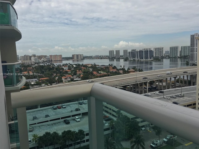 balcony featuring a water view