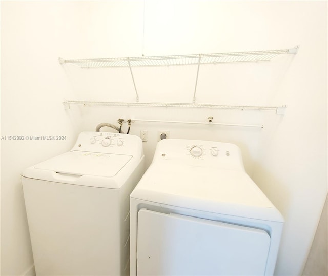 laundry area featuring separate washer and dryer