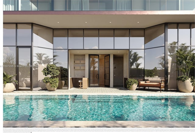 view of swimming pool featuring a patio area