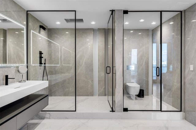 bathroom with tile walls, tile floors, a shower with shower door, and vanity