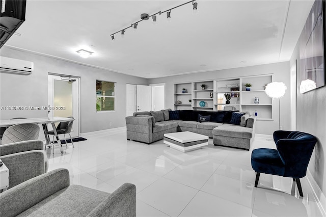 living room with light tile flooring, a wall mounted AC, and built in features