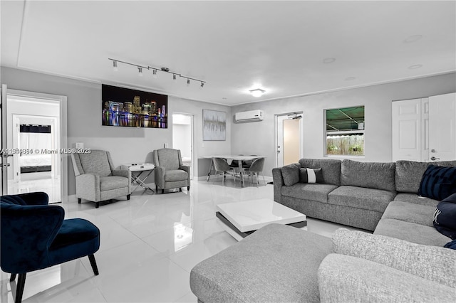 tiled living room featuring a wall mounted air conditioner and rail lighting