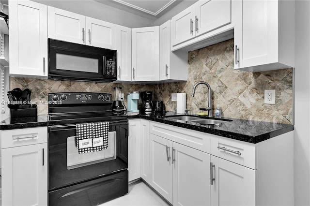 kitchen featuring backsplash, sink, black appliances, and white cabinetry