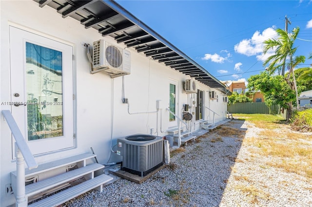 view of property exterior with central AC unit