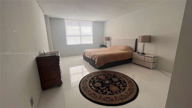 bedroom with a textured ceiling