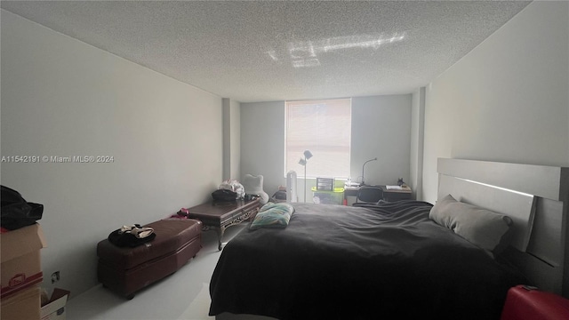 bedroom with a textured ceiling