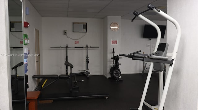 gym featuring a drop ceiling