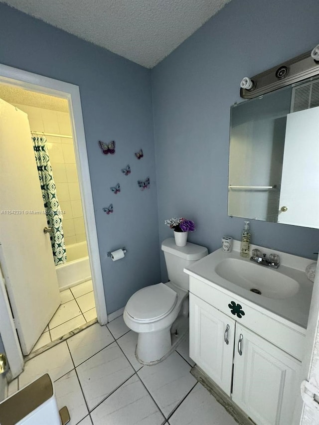 full bathroom with vanity, tile floors, toilet, and shower / bathtub combination with curtain