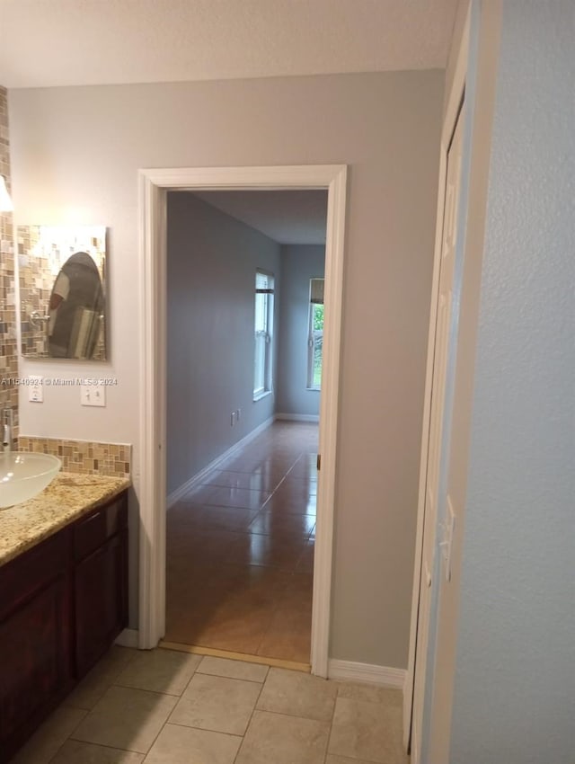 bathroom with vanity and tile patterned floors