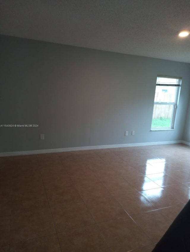 view of tiled empty room