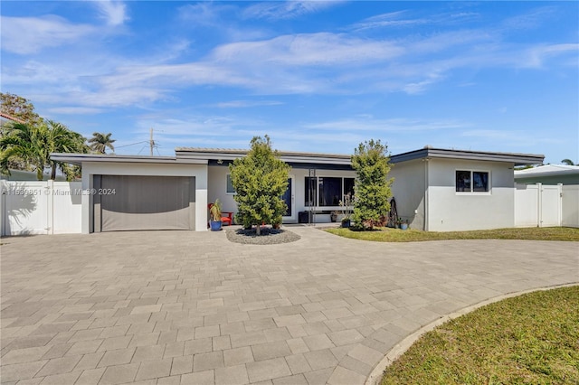 view of front of home featuring a garage