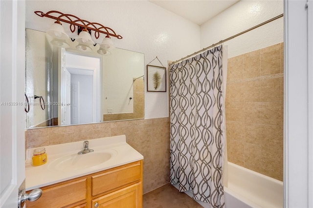 bathroom with shower / bathtub combination with curtain and oversized vanity