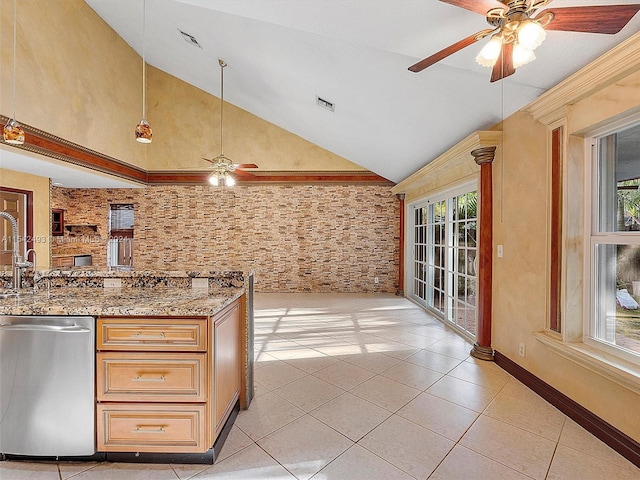 kitchen featuring dishwasher, ceiling fan, light tile floors, and light stone countertops