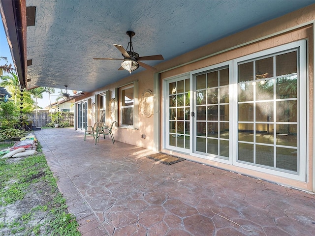 view of terrace featuring ceiling fan