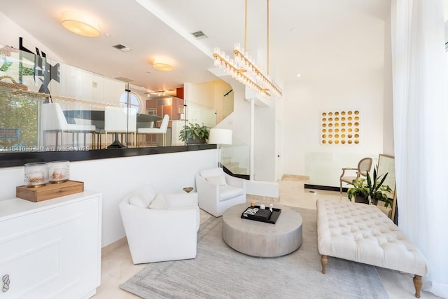 living room featuring an inviting chandelier