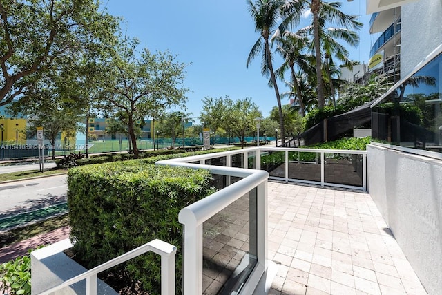 view of patio with a balcony