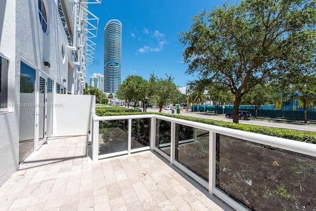 balcony featuring a city view