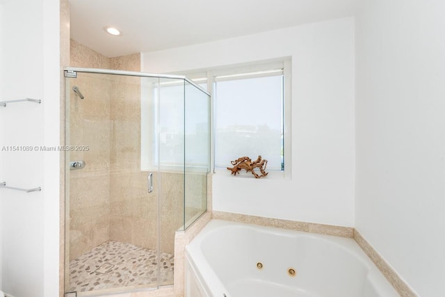 full bathroom featuring recessed lighting, a stall shower, and a whirlpool tub