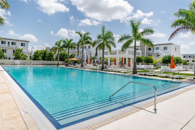 view of swimming pool with a patio