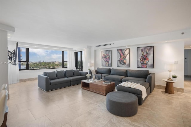 living room featuring light tile floors