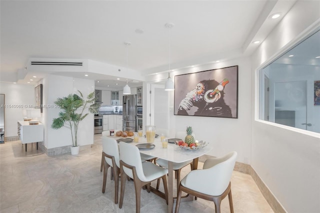 dining space featuring light tile floors