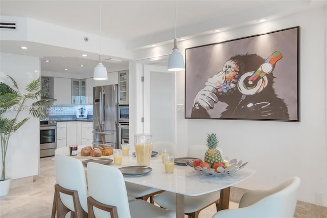 dining room with light tile floors