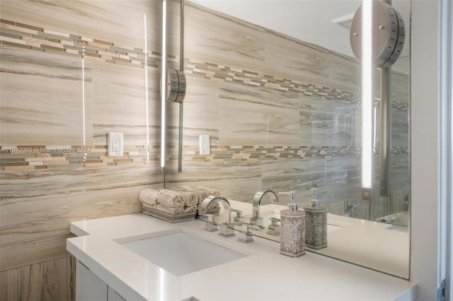 bathroom with vanity with extensive cabinet space