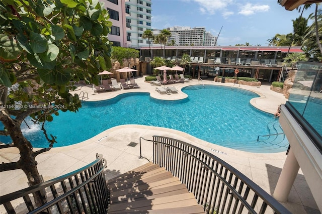 view of pool featuring a patio area