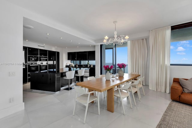 dining room featuring recessed lighting and a chandelier