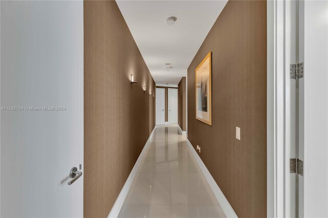 hallway with light tile flooring