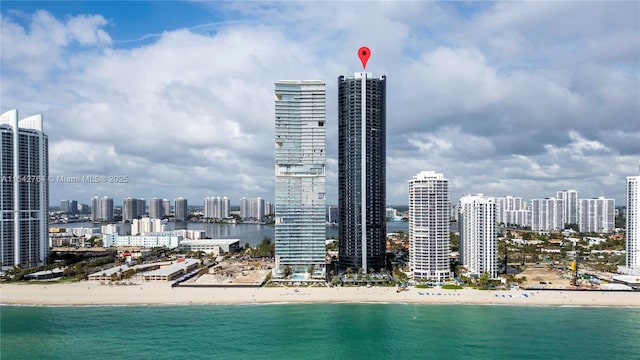 exterior space with a view of city and a beach view