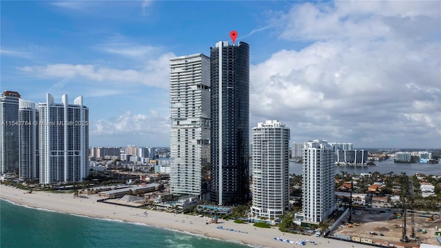 view of city with a water view and a view of the beach