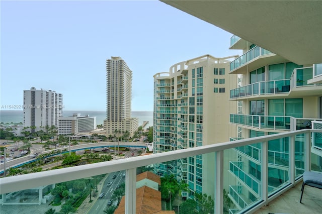 balcony featuring a water view