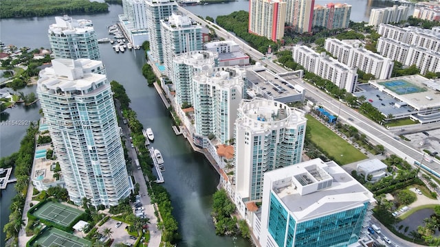 birds eye view of property featuring a water view