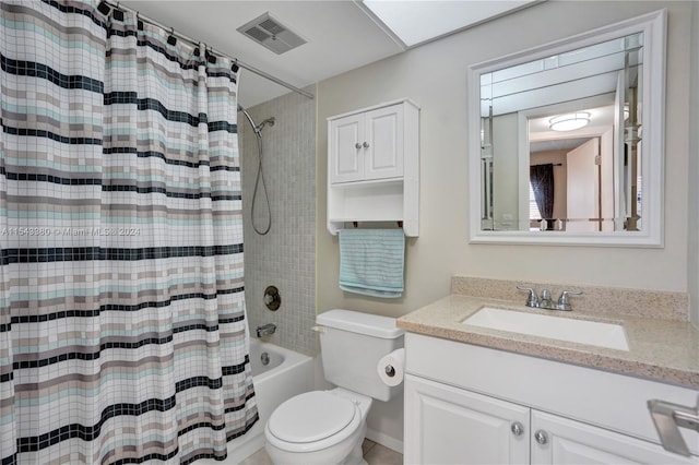 full bathroom featuring vanity, toilet, and shower / tub combo