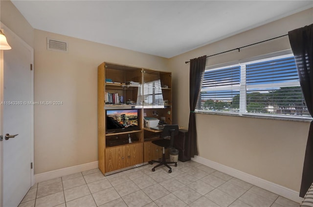 tiled office space with plenty of natural light