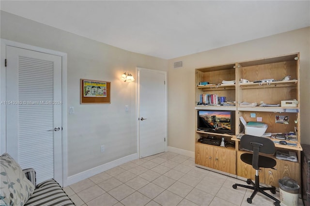 home office featuring light tile patterned floors